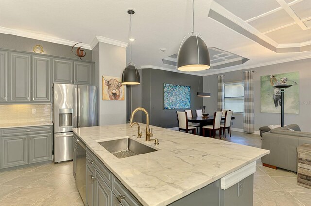 24193 Gallberry Dr, Venice, FL 34293 - kitchen featuring gray cabinetry, crown molding, a sink, and stainless steel appliances