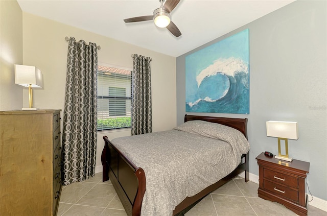24193 Gallberry Dr, Venice, FL 34293 - bedroom featuring light tile patterned floors, baseboards, and ceiling fan