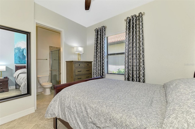 24193 Gallberry Dr, Venice, FL 34293 - tiled bedroom featuring ensuite bathroom, baseboards, and ceiling fan