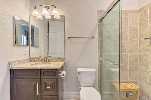 24193 Gallberry Dr, Venice, FL 34293 - full bathroom featuring toilet, a stall shower, and vanity