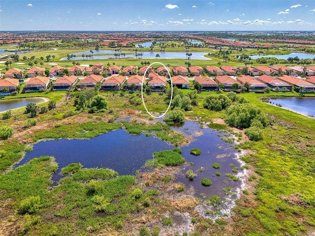 24193 Gallberry Dr, Venice, FL 34293 - bird's eye view featuring a water view, view of golf course, and a residential view