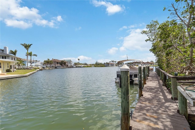 101 Louella Ln Unit 11, Nokomis, FL 34275 - dock with a water view and a residential view
