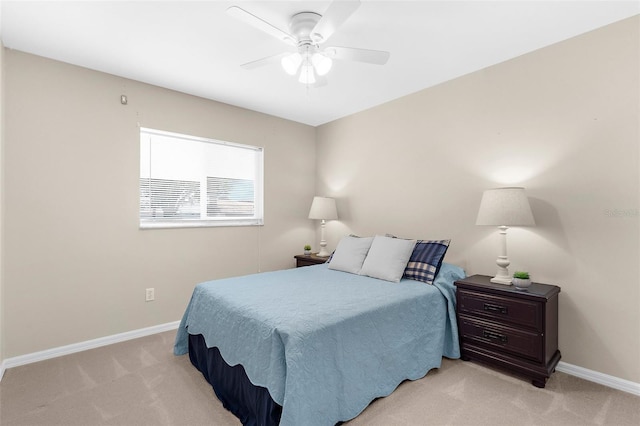 511 Porpoise Rd, Venice, FL 34293 - bedroom featuring ceiling fan, light carpet, and baseboards