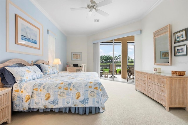 carpeted bedroom with ornamental molding, visible vents, access to exterior, and a ceiling fan