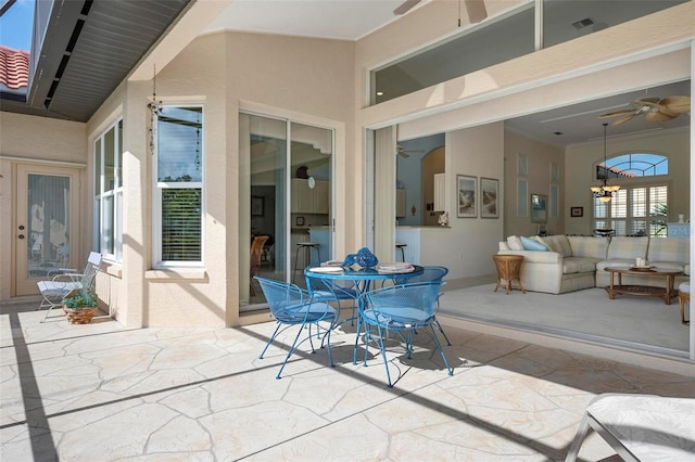 view of patio with an outdoor hangout area and outdoor dining area