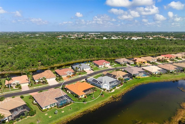 aerial view with a residential view and a water view