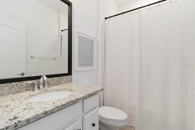 24153 Spartina Dr, Venice, FL 34293 - bathroom featuring toilet, curtained shower, and vanity