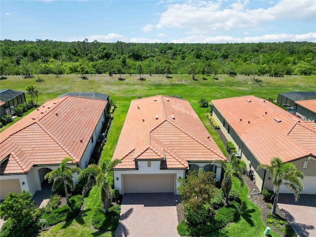 24153 Spartina Dr, Venice, FL 34293 - drone / aerial view featuring a view of trees