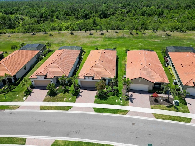 24153 Spartina Dr, Venice, FL 34293 - drone / aerial view with a forest view