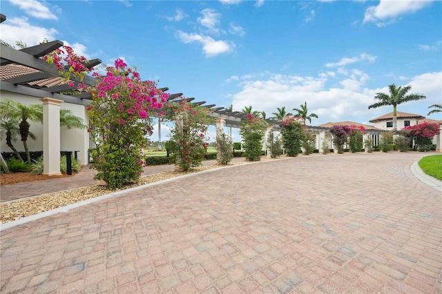 24153 Spartina Dr, Venice, FL 34293 - view of property's community with a pergola