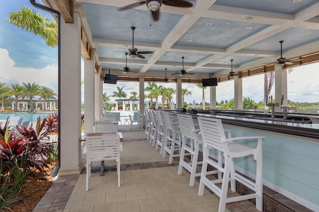 24153 Spartina Dr, Venice, FL 34293 - view of patio / terrace with outdoor dry bar, ceiling fan, and a sink