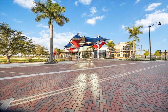 24153 Spartina Dr, Venice, FL 34293 - view of street featuring street lighting, sidewalks, curbs, and traffic signs
