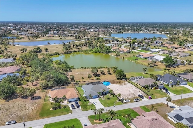 194 Sportsman Rd, Rotonda West, FL 33947 - drone / aerial view featuring a residential view and a water view