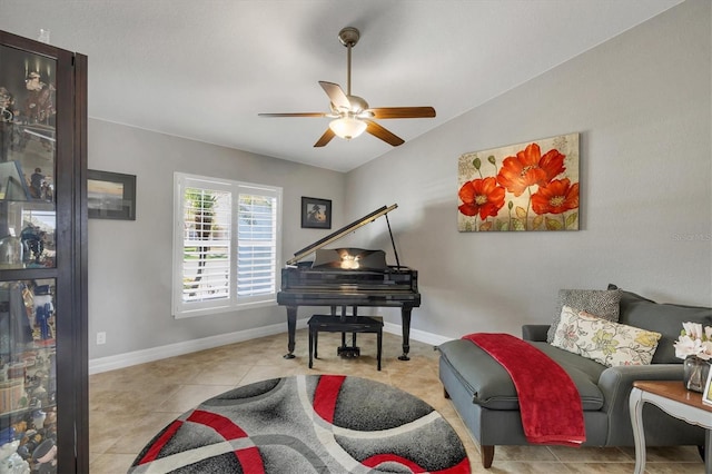 194 Sportsman Rd, Rotonda West, FL 33947 - sitting room featuring lofted ceiling, tile patterned floors, baseboards, and ceiling fan
