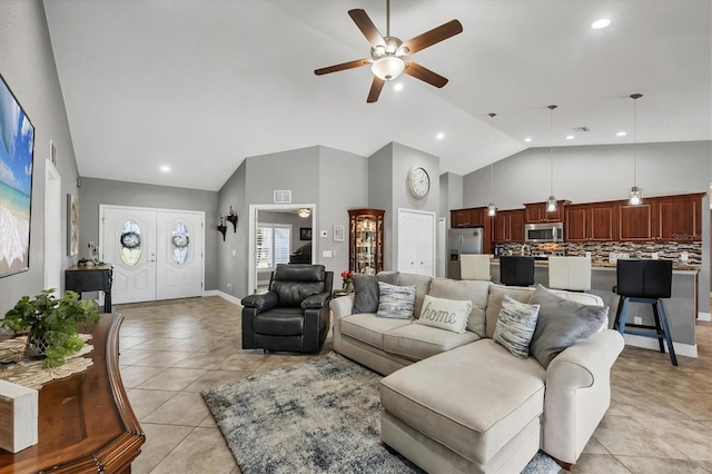 194 Sportsman Rd, Rotonda West, FL 33947 - living area with high vaulted ceiling, light tile patterned floors, ceiling fan, visible vents, and recessed lighting