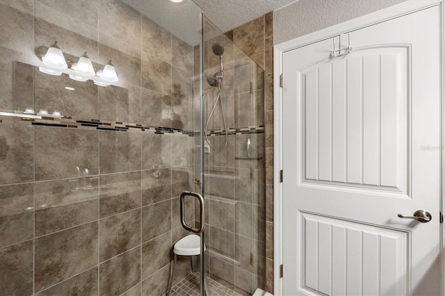 194 Sportsman Rd, Rotonda West, FL 33947 - bathroom with a shower stall and a textured ceiling