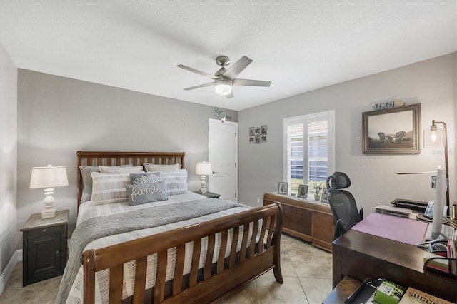 194 Sportsman Rd, Rotonda West, FL 33947 - bedroom with ceiling fan and light tile patterned floors