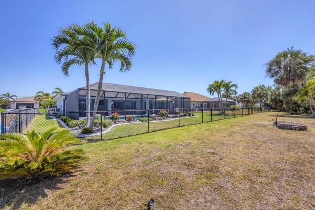 194 Sportsman Rd, Rotonda West, FL 33947 - view of yard featuring fence