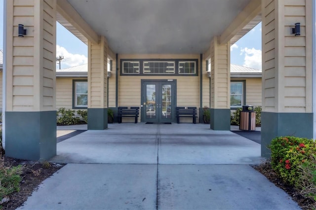194 Sportsman Rd, Rotonda West, FL 33947 - view of exterior entry with french doors