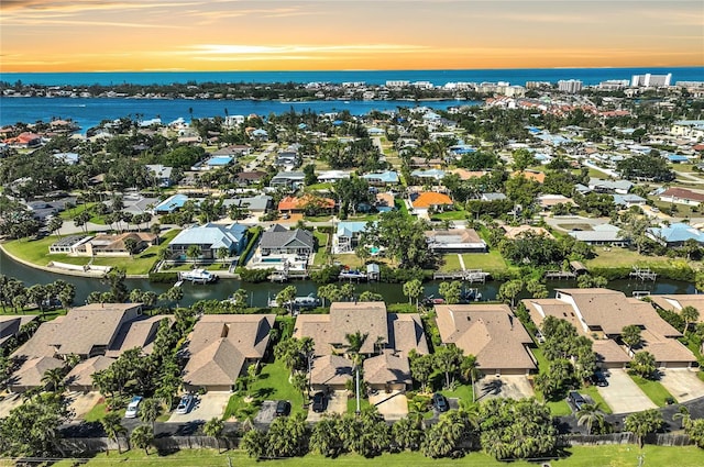 6724 Schooner Bay Cir Unit 6724, Sarasota, FL 34231 - aerial view at dusk of a water view and a residential view
