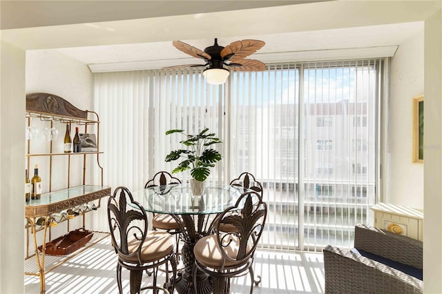 dining room featuring ceiling fan