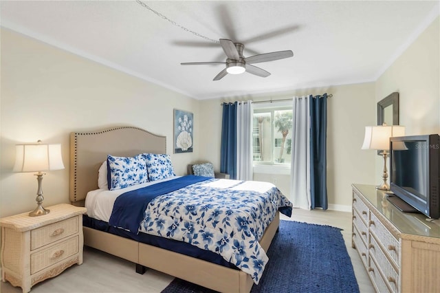 bedroom featuring crown molding and ceiling fan