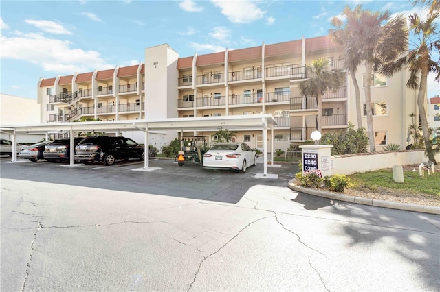 view of property with covered parking