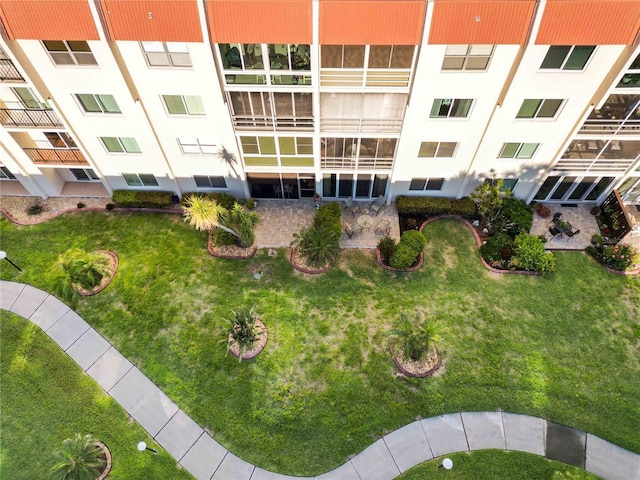 view of community with a lawn