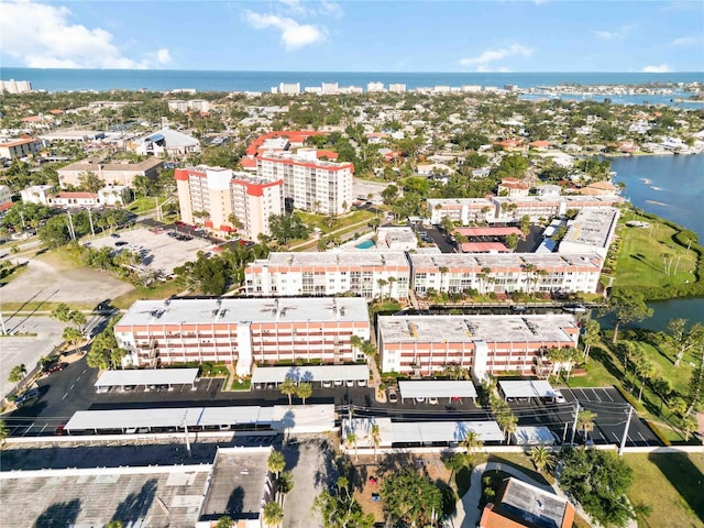 aerial view with a water view and a view of city
