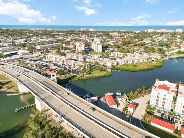 drone / aerial view with a water view and a view of city