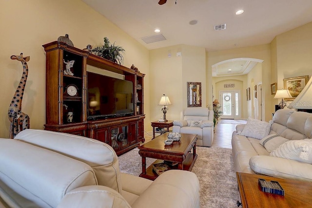 2542 Cortenova Ct, Venice, FL 34292 - living area with recessed lighting, arched walkways, visible vents, and tile patterned flooring