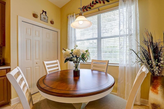2542 Cortenova Ct, Venice, FL 34292 - dining space with light tile patterned floors