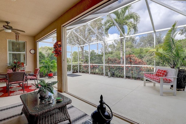 2542 Cortenova Ct, Venice, FL 34292 - sunroom featuring a ceiling fan