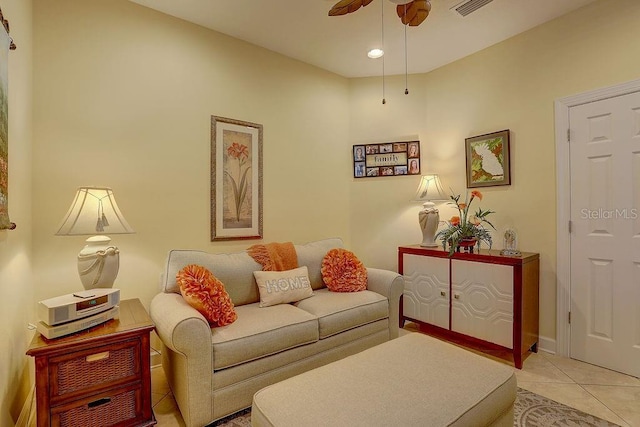 2542 Cortenova Ct, Venice, FL 34292 - tiled living room featuring visible vents and a ceiling fan