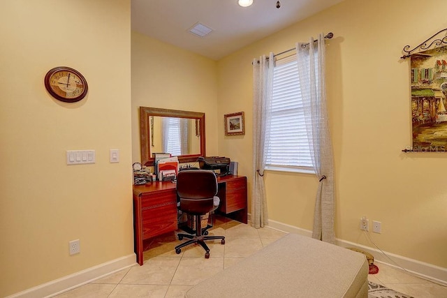 2542 Cortenova Ct, Venice, FL 34292 - home office with light tile patterned floors, visible vents, and baseboards