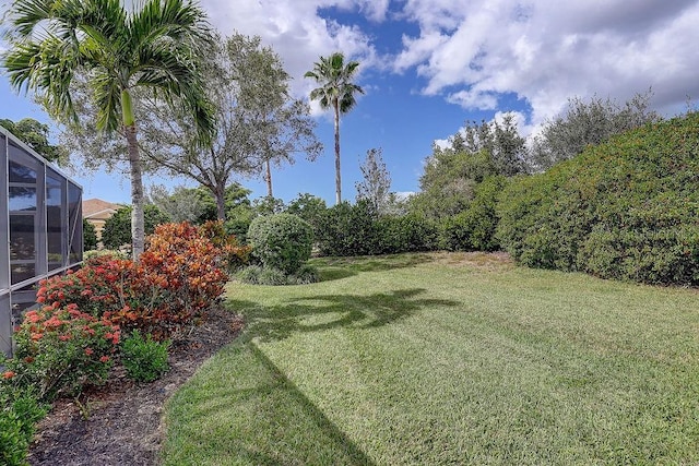 2542 Cortenova Ct, Venice, FL 34292 - view of yard featuring glass enclosure