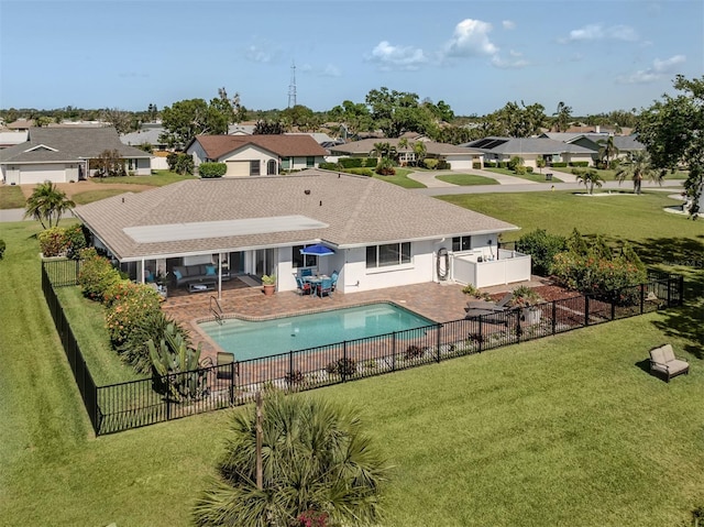 1232 Pine Needle Rd, Venice, FL 34285 - view of swimming pool featuring a yard, a fenced backyard, a residential view, and a patio area