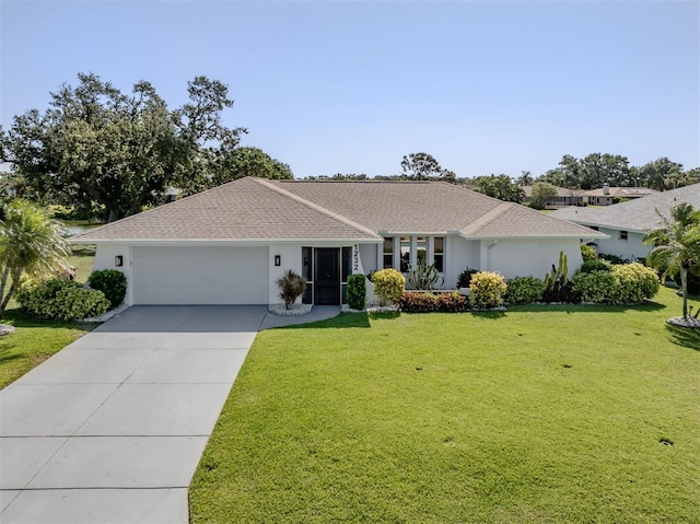 1232 Pine Needle Rd, Venice, FL 34285 - single story home featuring a front yard, a shingled roof, a garage, stucco siding, and driveway