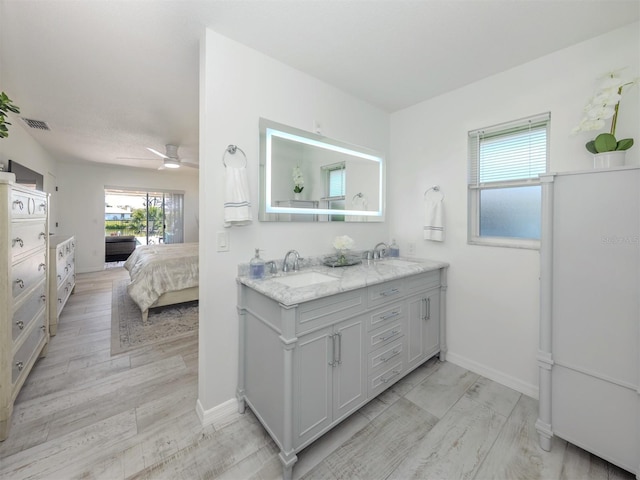 1232 Pine Needle Rd, Venice, FL 34285 - bathroom featuring a sink, visible vents, double vanity, and ensuite bath
