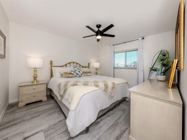 1232 Pine Needle Rd, Venice, FL 34285 - bedroom with light wood-style floors, baseboards, and ceiling fan