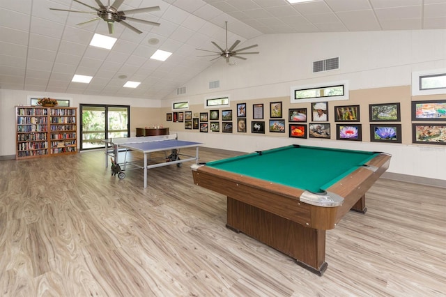 1232 Pine Needle Rd, Venice, FL 34285 - rec room featuring visible vents, high vaulted ceiling, a ceiling fan, and wood finished floors