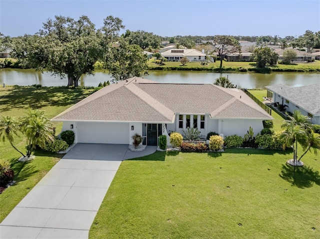 1232 Pine Needle Rd, Venice, FL 34285 - ranch-style home featuring a water view, a front yard, concrete driveway, and an attached garage