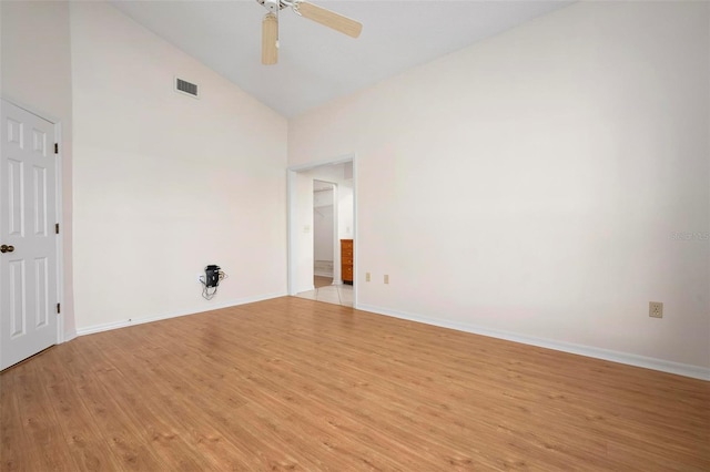 799 Harrington Lake Dr N Unit 73, Venice, FL 34293 - unfurnished room with high vaulted ceiling, light wood-type flooring, baseboards, and ceiling fan