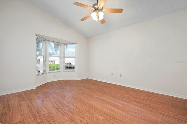 799 Harrington Lake Dr N Unit 73, Venice, FL 34293 - spare room featuring light wood-style floors, baseboards, a ceiling fan, and lofted ceiling