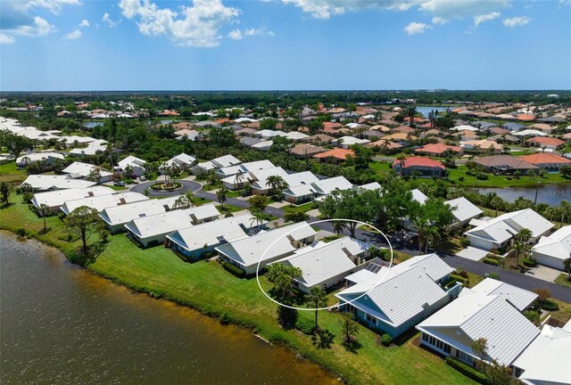 799 Harrington Lake Dr N Unit 73, Venice, FL 34293 - drone / aerial view with a water view and a residential view