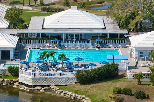 799 Harrington Lake Dr N Unit 73, Venice, FL 34293 - pool with a water view and fence