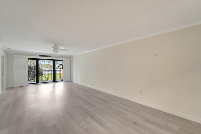 700 Golden Beach Blvd Unit 115, Venice, FL 34285 - unfurnished room with crown molding, ceiling fan, baseboards, and light wood-style flooring