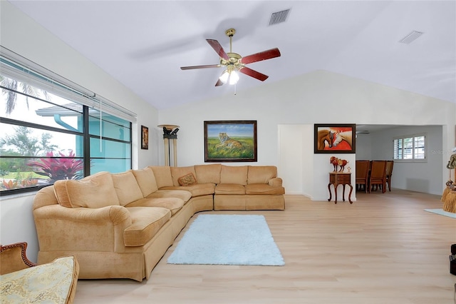 990 Sea Fox Rd, Venice, FL 34293 - living area featuring lofted ceiling, visible vents, a ceiling fan, and light wood-style flooring