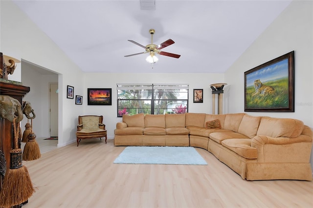 990 Sea Fox Rd, Venice, FL 34293 - living room featuring baseboards, vaulted ceiling, visible vents, ceiling fan, and wood finished floors