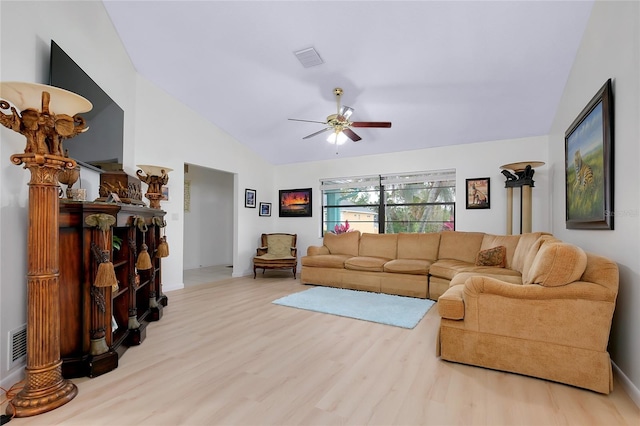 990 Sea Fox Rd, Venice, FL 34293 - living area featuring wood finished floors, visible vents, ceiling fan, and vaulted ceiling